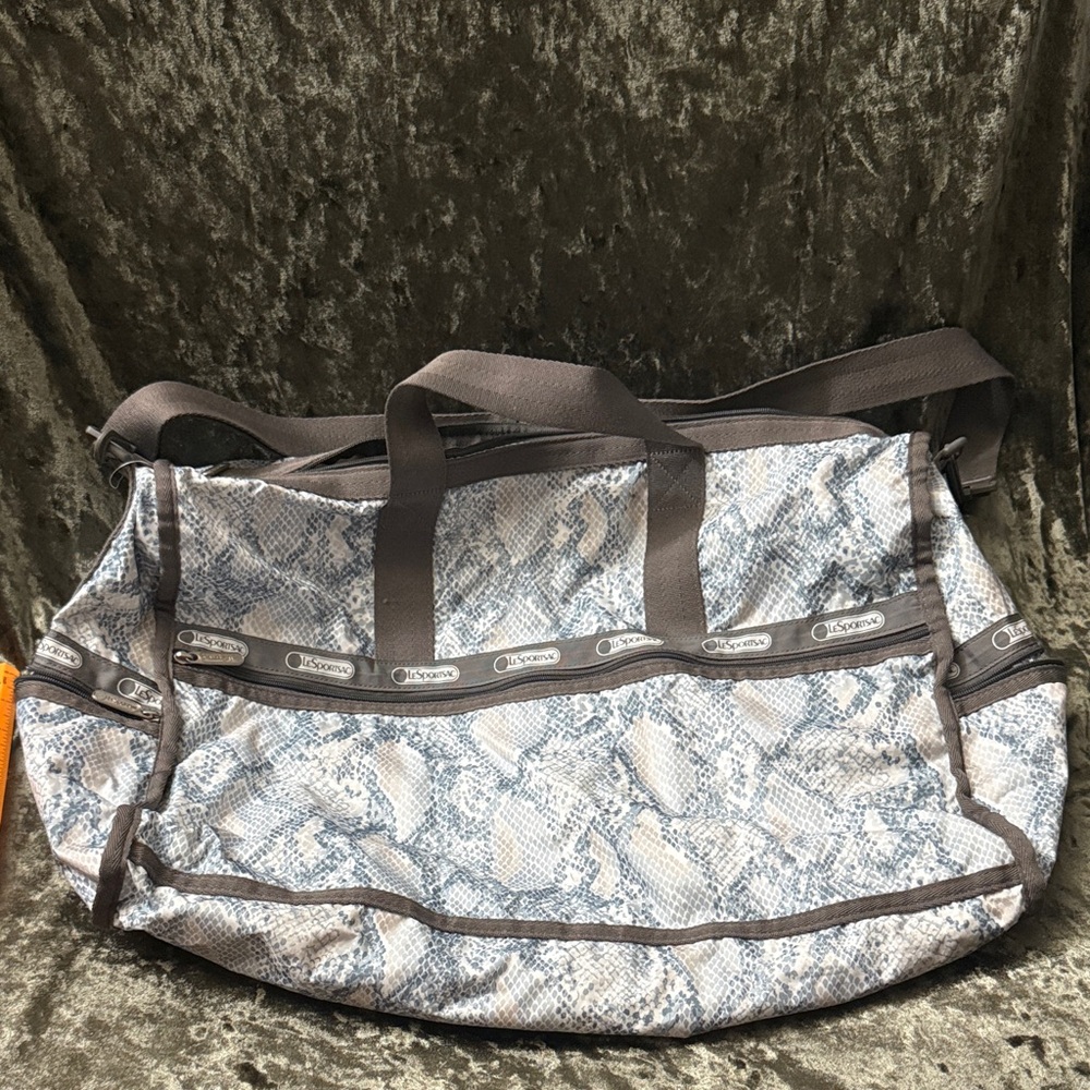 LESPORTSAC Snakeskin duffel bag. Grey and blue color